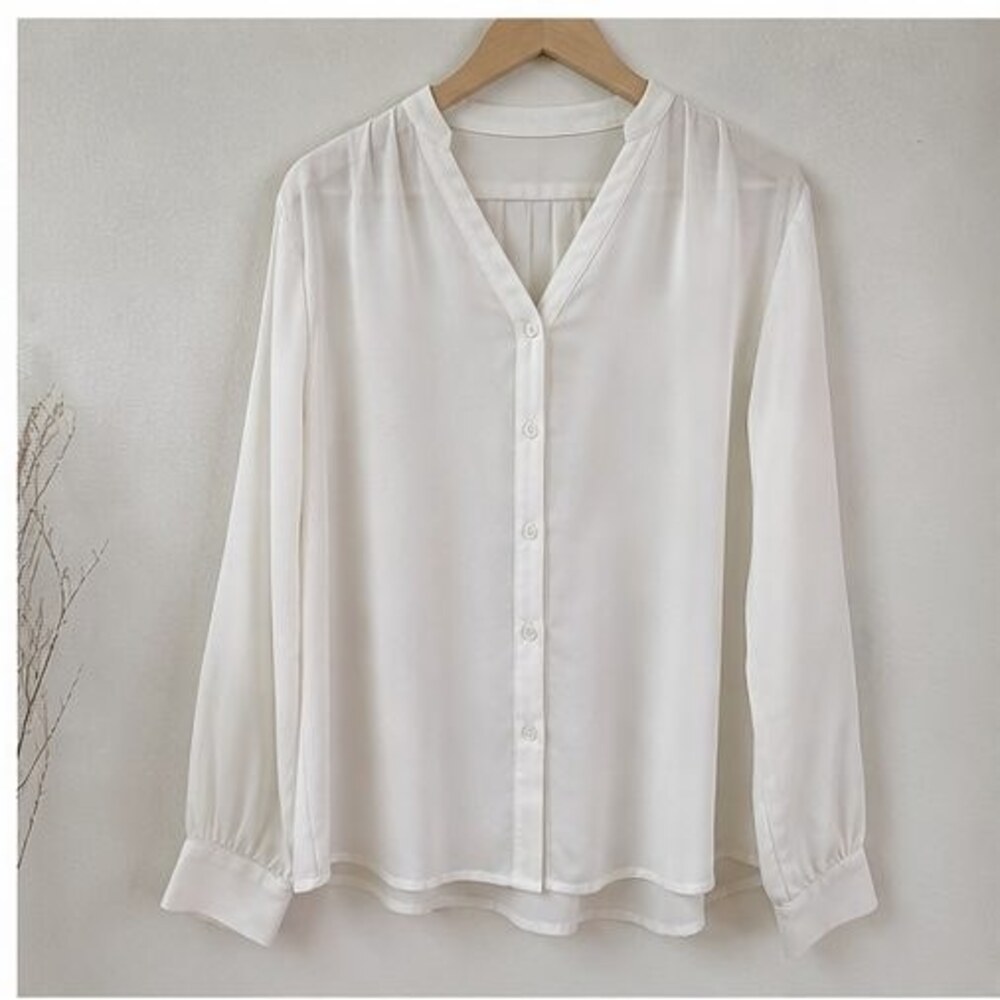 Ivory Peplum Top